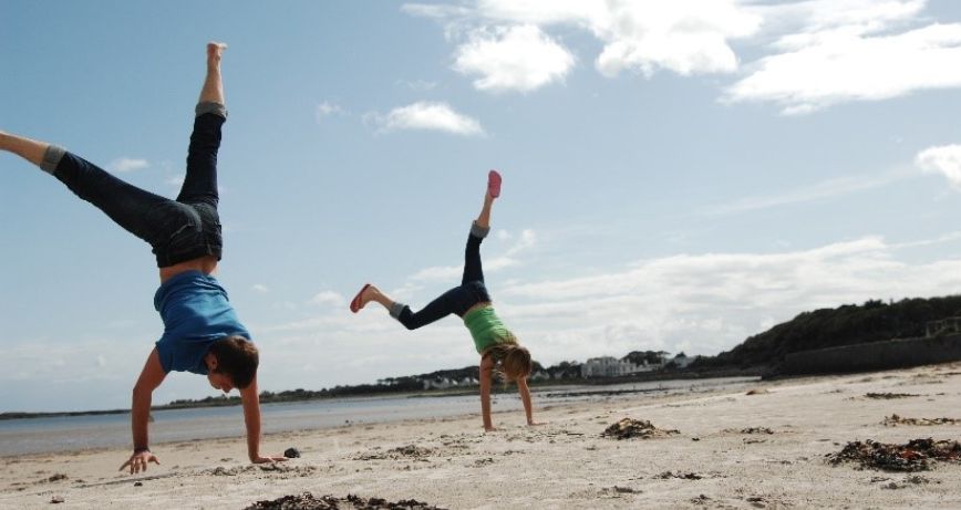 Handstands on the beach